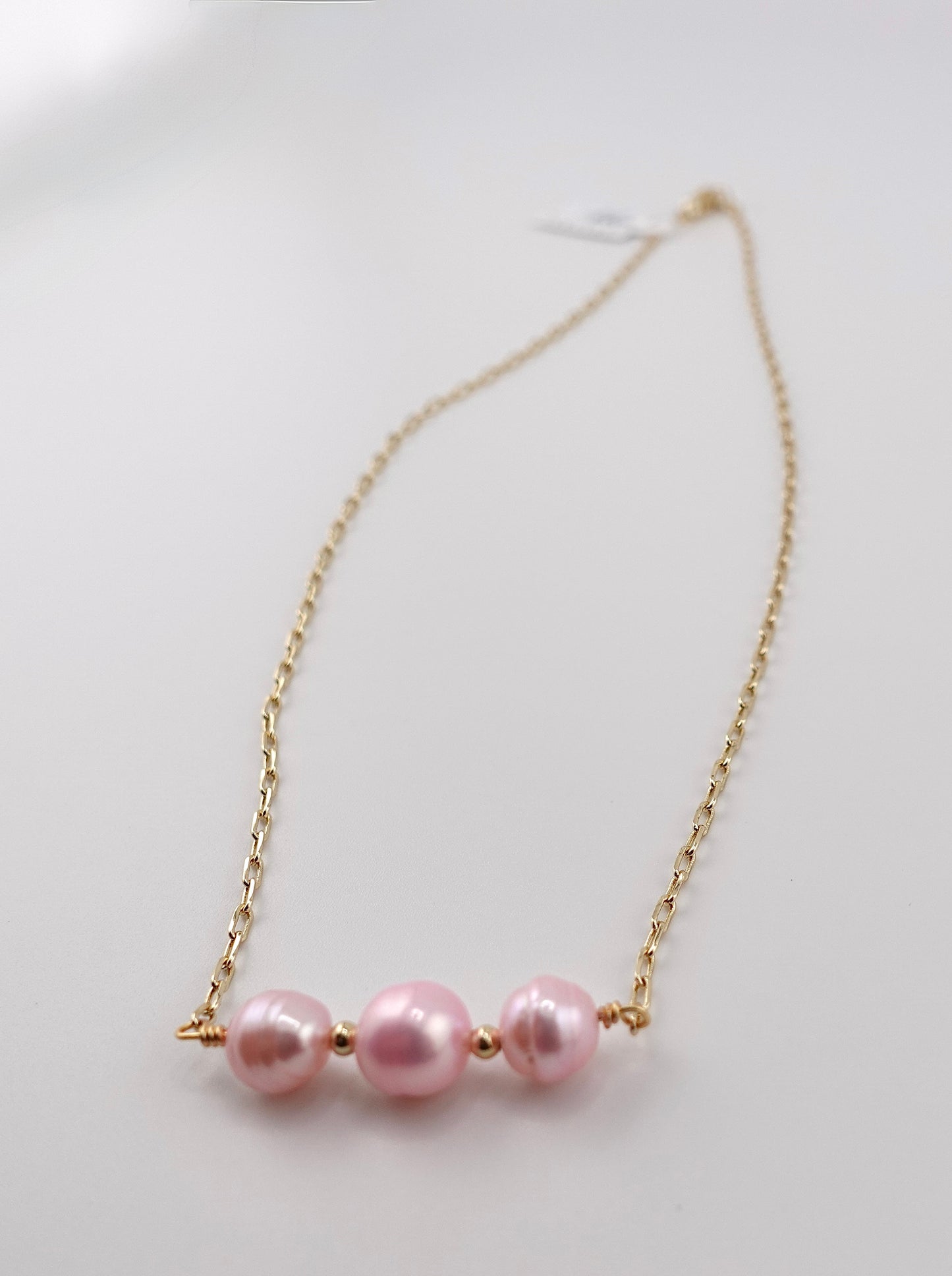 Triple pink pearl necklace