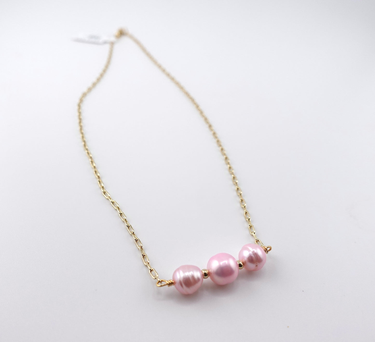 Triple pink pearl necklace