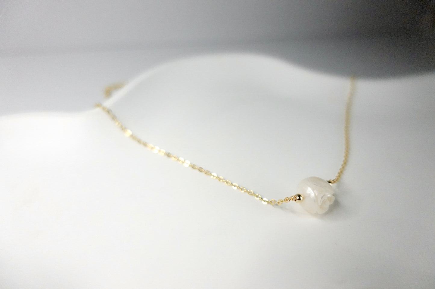 Carved pearl necklace