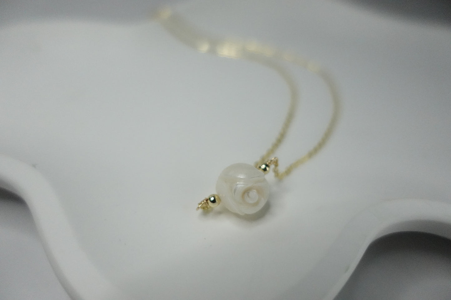 Carved pearl necklace