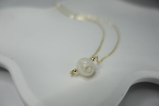 Carved pearl necklace