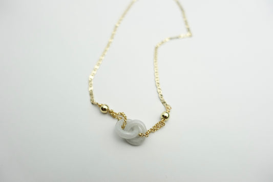 Interlinked white jade necklace